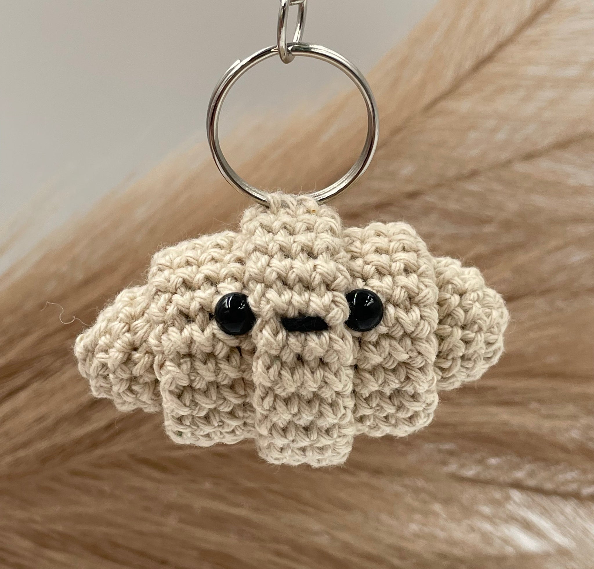 Schlüsselanhänger "Crossaint"