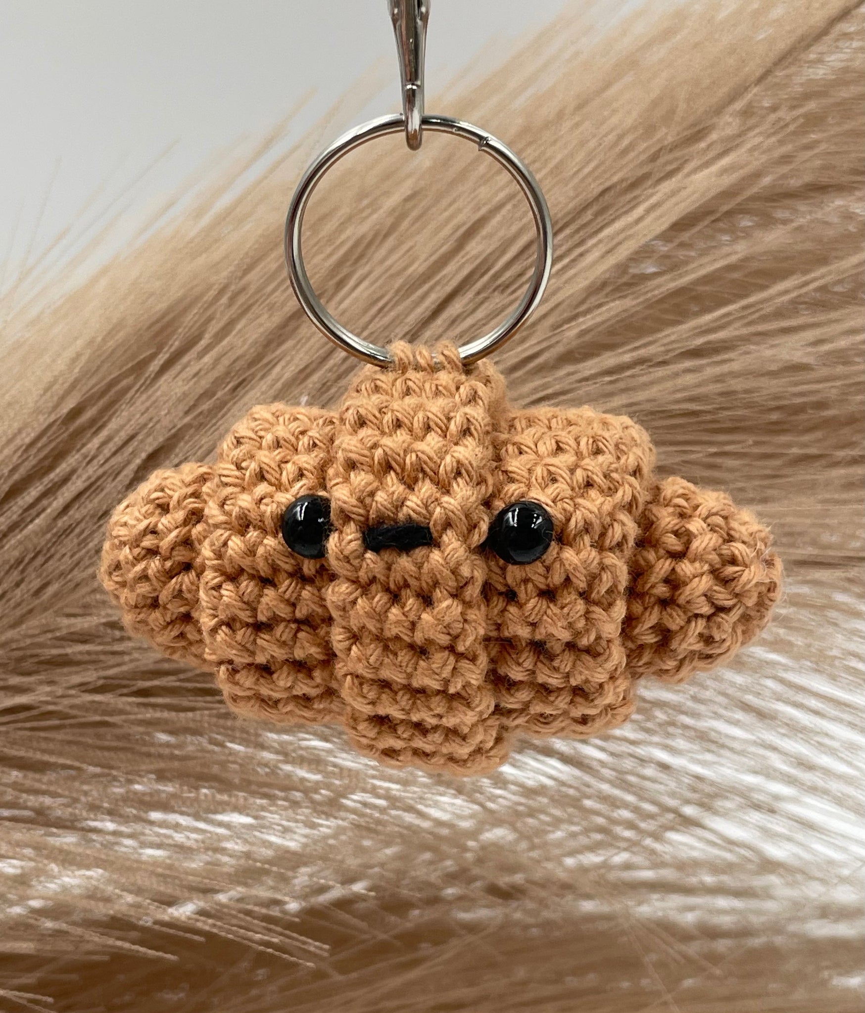 Schlüsselanhänger "Crossaint"