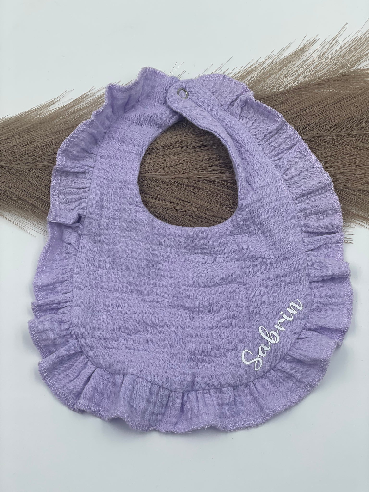 Lätzchen mit Rüschen